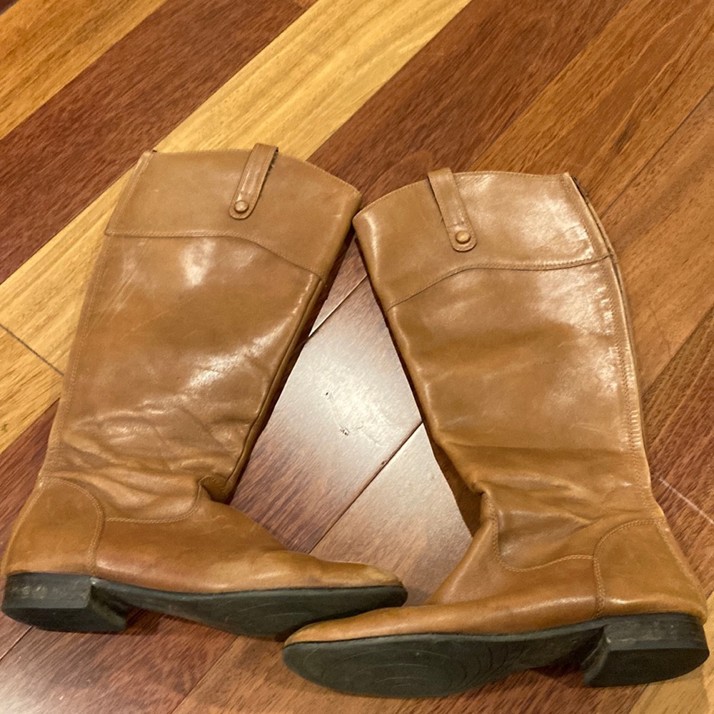 Woman’s Ciao Bella tan leather boots with back zipper.  Worn . Fair condition.